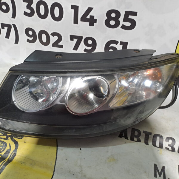 Фара передня ліва Hyundai Santa Fe 2006-2012 921012B025